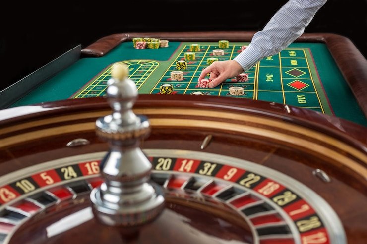 Antarmuka tempat taruhan American Roulette dengan papan pembayaran dan metode pembayaran DANA OVO